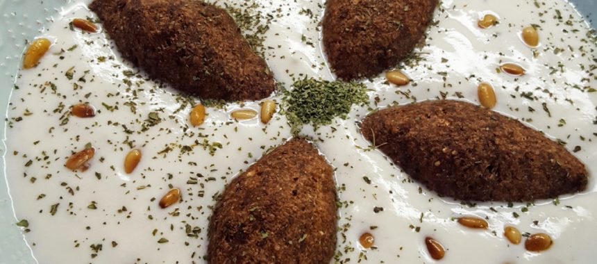 Kibbeh Bi Laban (Fried Kibbeh Meatballs in Yogurt sauce)